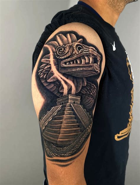 quetzal tattoo|aztec feathered serpent tattoo.